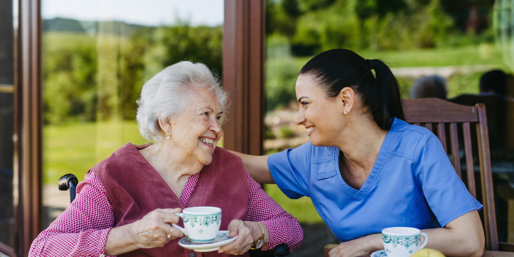 Connecticut assisted living planning: Elderly resident with caregiver in a safe and comfortable facility